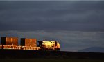 CN 2841 leads a W/B unit stack train on the south side down grade of the Hwy 99 overpass towards Control Point Gulf.